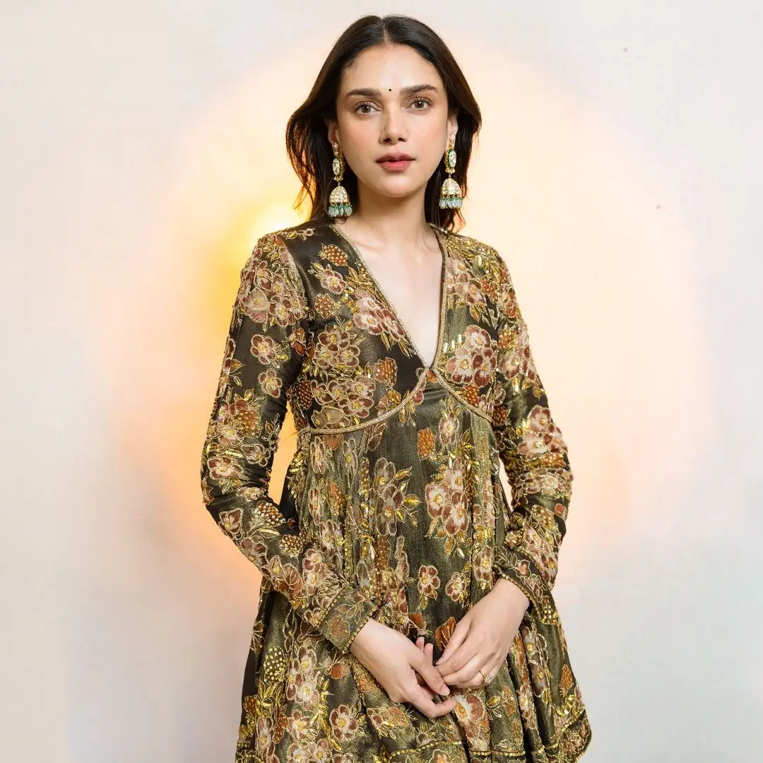 Hindi Actress Aditi Rao Hydari Stills In Green Designer Gown